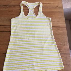 Yellow and white striped tank top size 8.